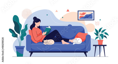 A woman relaxes on a comfortable blue sofa with a book and two cats, enjoying a peaceful moment indoors with houseplants and artwork.