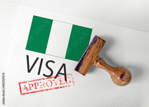 Nigeria Visa Approved with Rubber Stamp and flag
