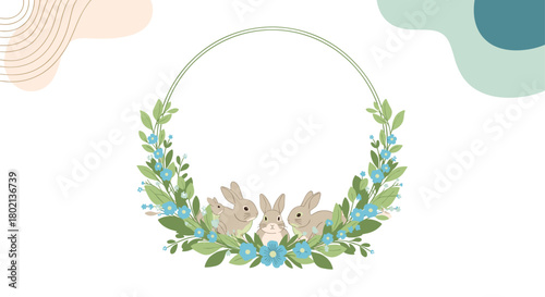 Charming illustration of three adorable bunnies nestled amongst lush greenery and delicate blue flowers within a circular wreath design, perfect for spring celebrations.