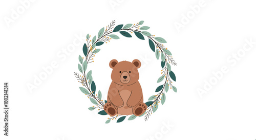 A charming illustration features a cute brown bear sitting within a circular wreath of delicate green and gold leaves, creating a peaceful woodland scene.