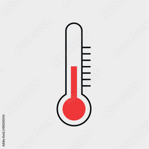 Thermometer with red liquid indicating a temperature reading on a light gray background.