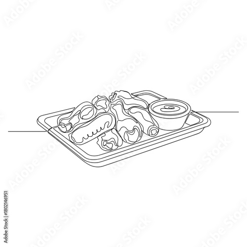 Tray of chicken wings with dipping sauce for NFL playoffs tailgate  