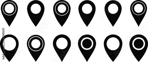 Collection of black location pins with varying circle designs displayed neatly