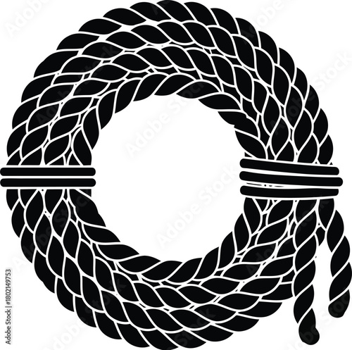 A coiled black rope shaped in a circular form isolated on white background