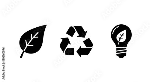 Eco symbols: leaf, recycling, and renewable energy bulb in simple silhouette design