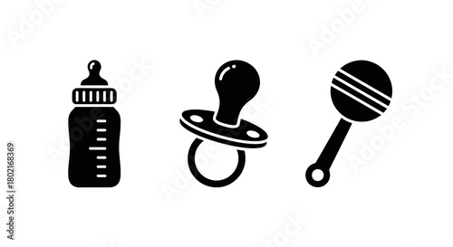 Silhouette set of baby essentials: bottle, pacifier, rattle