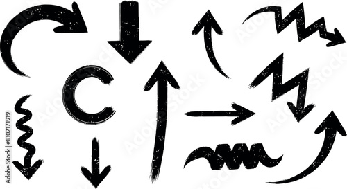 Collection of hand drawn sketchy arrows and directional symbols in various styles and directions on a white background