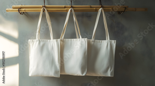 Clothes drying on a clothesline above a blank brown paper shopping bag
