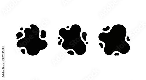 Abstract ink splatter shapes set with minimalist design on white background