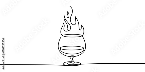 a cocktail glass with flames rising above it, symbolizing heat, energy, nightlife, and dramatic drink presentation.