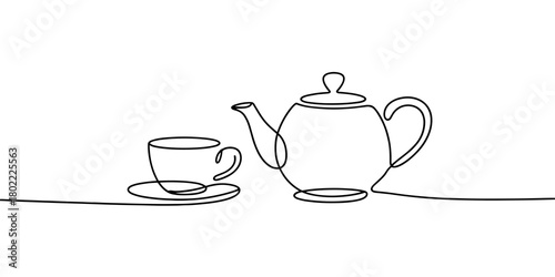 a teapot with a cup and saucer, representing tea time, calm moments, minimal design, and cozy beverage themes.