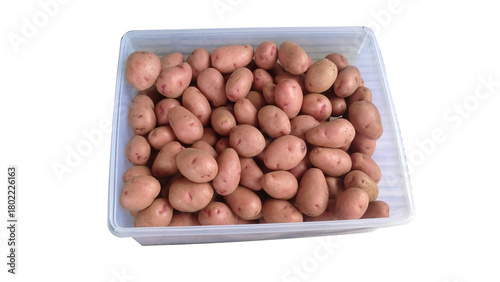 Wallpaper Mural Fresh pink potatoes in a clear plastic container. High-quality raw potatoes for cooking, market display, food ingredients, and agricultural product promotions Torontodigital.ca