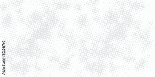 Grunge halftone abstract background with a soft, faded texture and dotted pattern. great for vintage, retro, or artistic design themes.
