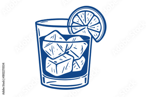 Cocktail glass with ice cubes and citrus slice garnish