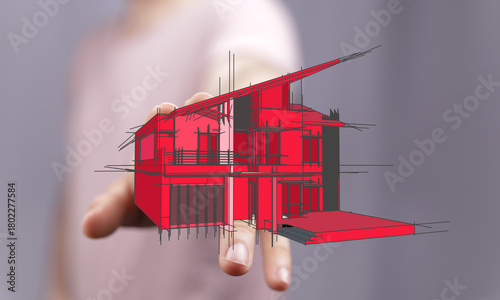 Architect holding a red hou...