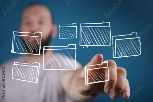 Hand pointing at virtual fo...