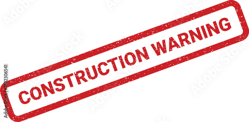 A bold red rubber stamp clearly displaying the phrase CONSTRUCTION WARNING on a pristine white surface, alerting about hazards