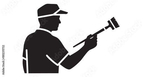 Silhouette of an Auctioneer Bidding with a Gavel at Auction