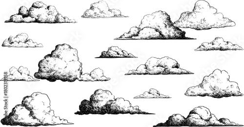 Vintage black and white cloud illustration set showing hand drawn fluffy cumulus clouds in sketch engraving style for design use