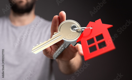 A person holding a key with...