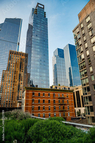 Modern skyline near Hudson Yards. A modern skyline near Hudson Yards glows in the evening sun along the High Line.