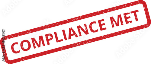 A textured red rectangular rubber stamp showing the official phrase COMPLIANCE MET printed against a clean white background
