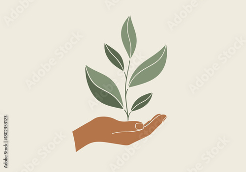 Minimalist hand holding green plant with leaves on neutral background