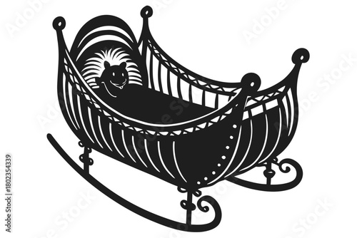 Baby sleeping peacefully in a traditional ornate rocking cradle