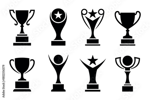 Collection of various award trophies and symbols of achievement.