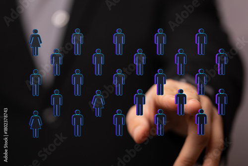Hand pointing at a human ic...