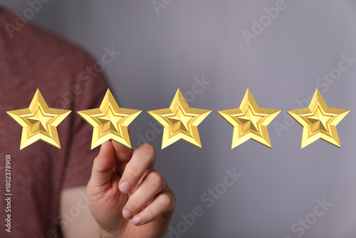 A hand pointing at golden s...