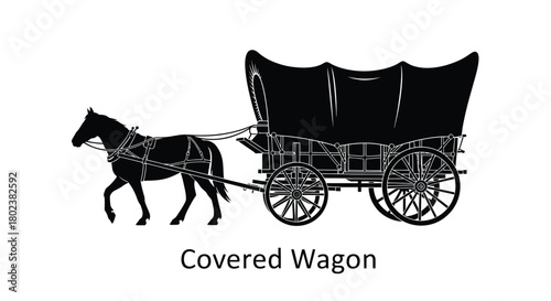 A silhouette of a horse pulling a classic covered wagon design