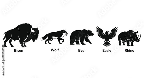 Silhouette representations of a bison wolf bear eagle and rhinoceros