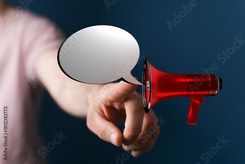 Person points with a megaph...