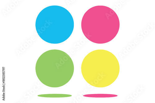 Four colorful circles arranged in a grid with shadows beneath them.