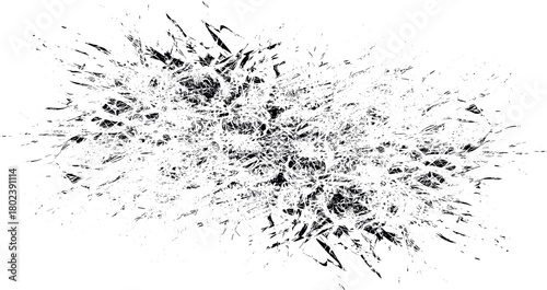Monochrome abstract explosion of shattered glass fragments.