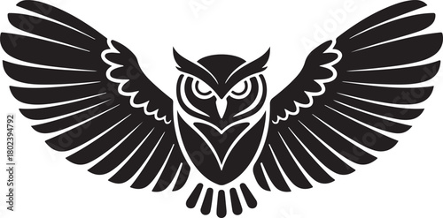 Striking silhouette of a majestic owl with wings spread wide in a powerful and elegant display of nocturnal grace