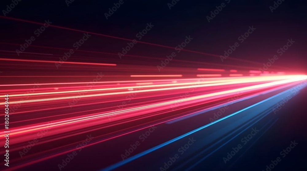 Fototapeta premium Dynamic light trails in vibrant pink and blue hues create a sense of motion and energy.