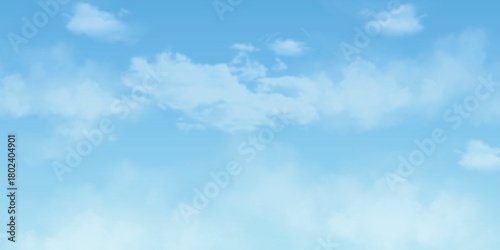 Light clouds in the blue sky. Blue Sky and puffy clouds. A horizontal shot of bright blue sky with puffy white clouds.