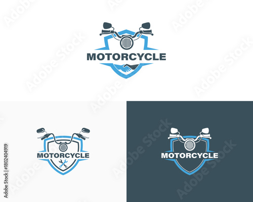 Motorcycle emblem with handlebars and wrench on shield logo
