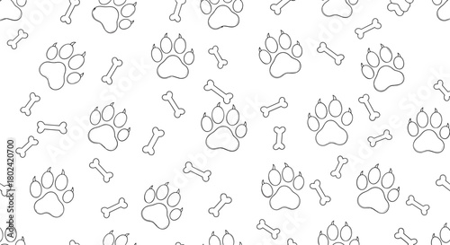 Seamless pattern featuring playful black and white paw prints and bone shapes scattered across a clean white background, ideal for pet-themed designs.