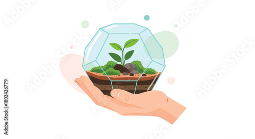 Human hand carefully holding a geometric glass terrarium containing a small green sprout, symbolizing environmental protection.