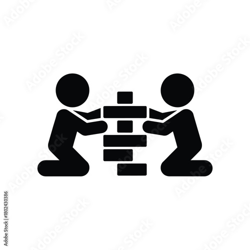 Children playing a block stacking game together