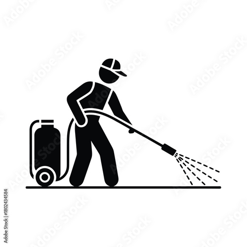 Worker sprays liquid from a portable tank