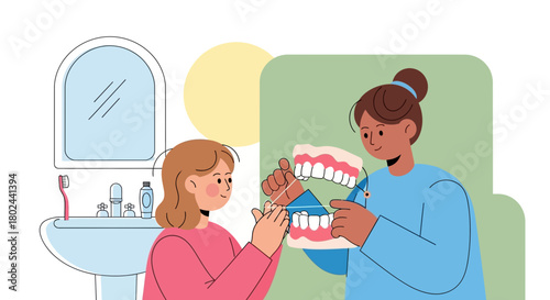 Dental hygiene demonstration a young girl learning proper flossing techniques from a dentist on a tooth model