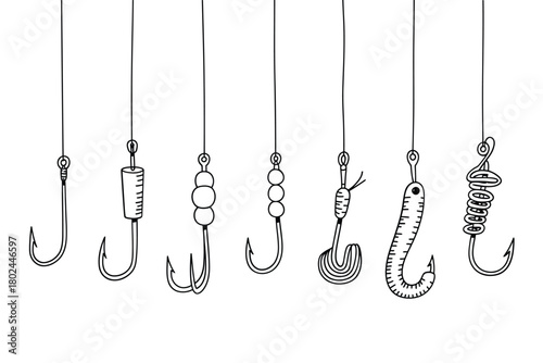 Collection of various fishing hooks and lures on white background