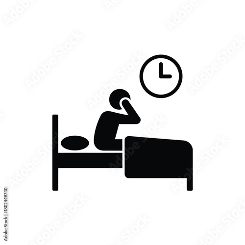 Person waking up in bed with alarm clock