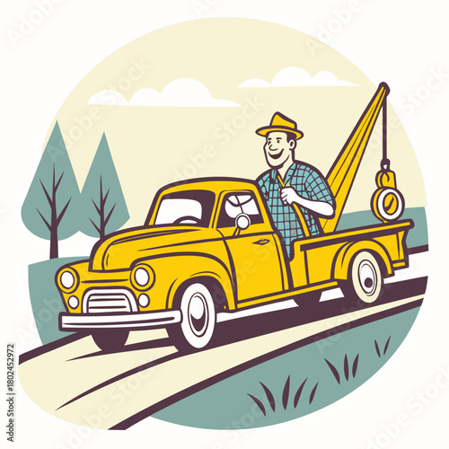 Happy tow truck driver in a vintage yellow truck