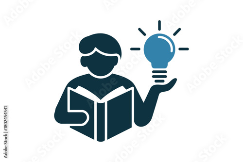 A person reads a book and holds a lightbulb, symbolizing an idea.