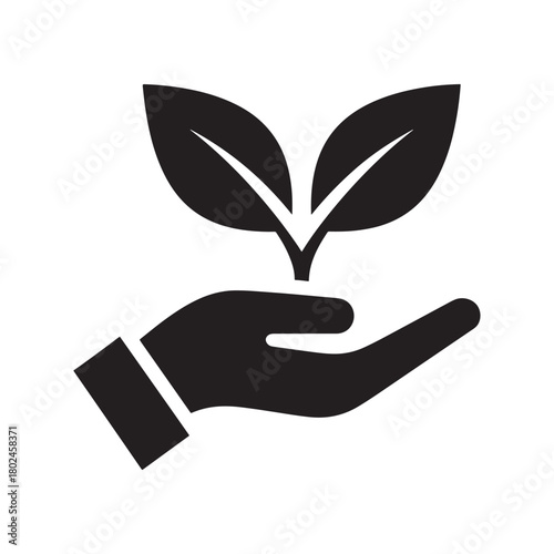 Hand gently cradling a young plant with two leaves, symbolizing growth and ecology now.